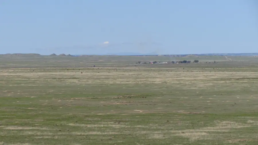 A ranch in the distance at Comanche National Grassland