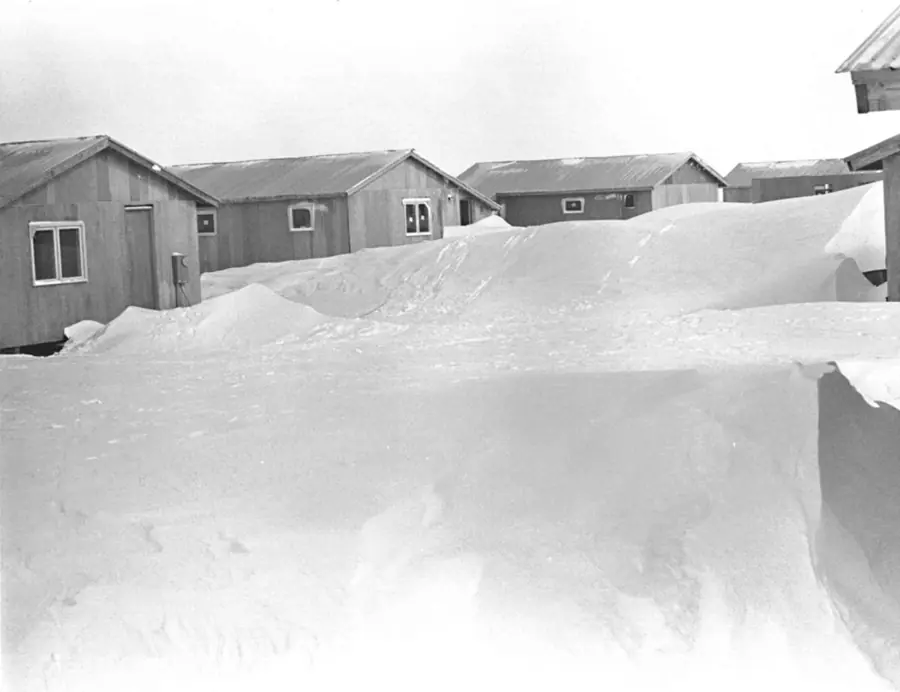 Houses in snow old photo