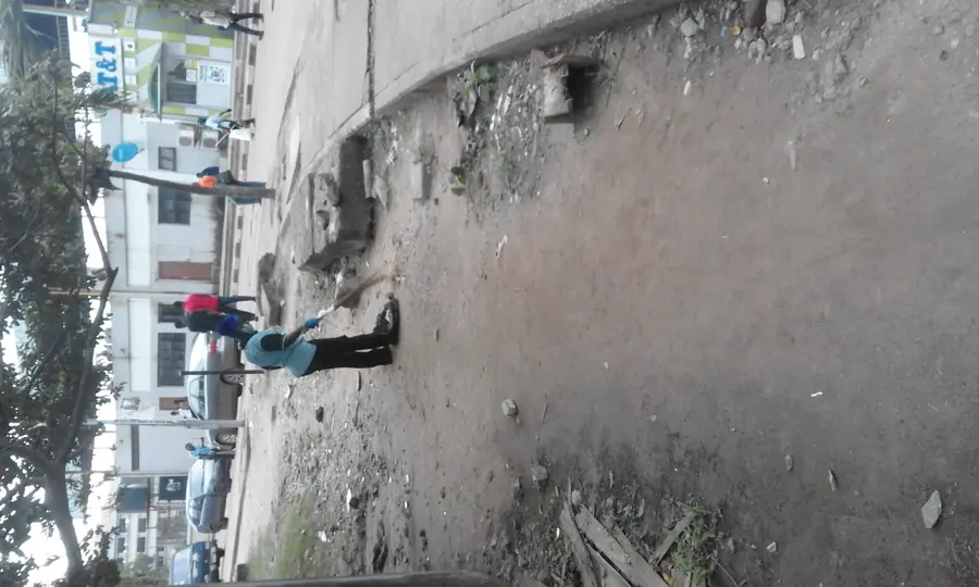 A cleaner sweeping in Yaba College of Technology Polytechnic2