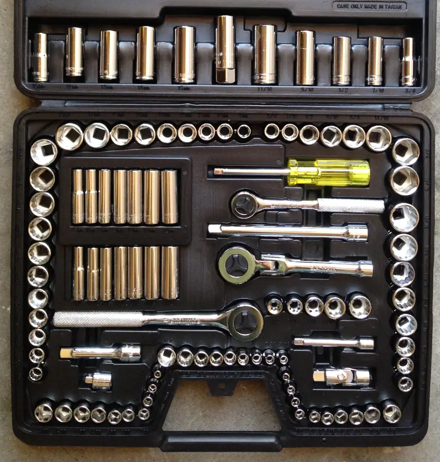 Mechanic's tool set with three socket wrenches and a variety of sockets from Blackhawk (cropped)