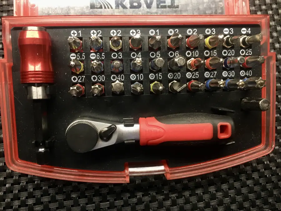Miniature bit set with wrench for carrying on belt